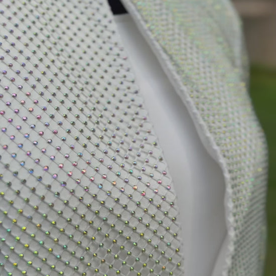 Video of a dog show handler suit in white with sparkling stones. Diamond by Canis Certo.