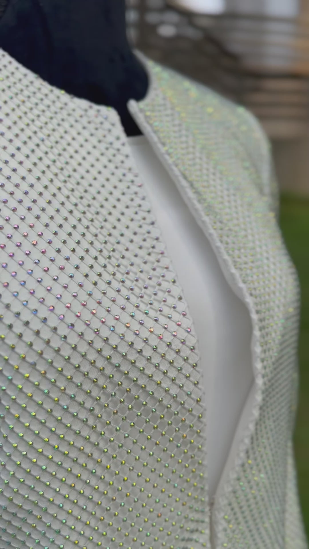 Video of a dog show handler suit in white with sparkling stones. Diamond by Canis Certo.